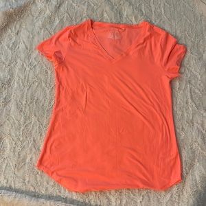 No Boundaries neon coral colored stretchy top